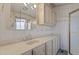 Bathroom featuring a glass enclosed shower and vanity at 111 S Greenfield Rd # 313, Mesa, AZ 85206
