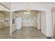 Bright kitchen features wood-tone cabinetry, updated appliances, and recessed lighting at 111 S Greenfield Rd # 313, Mesa, AZ 85206