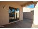 Sliding glass doors lead to the covered back patio at 11835 W Windsor Ave, Avondale, AZ 85392