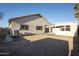 A large backyard with a shed and cinder block fence surrounding property at 11835 W Windsor Ave, Avondale, AZ 85392