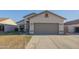 Charming single-story home with a two-car garage and low maintenance desert landscaping at 11835 W Windsor Ave, Avondale, AZ 85392