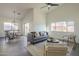 Open-concept living room and dining area filled with natural light and modern decor at 11835 W Windsor Ave, Avondale, AZ 85392