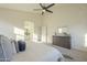 Comfortable main bedroom is decorated with neutral colors and includes a ceiling fan at 11835 W Windsor Ave, Avondale, AZ 85392