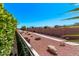 The backyard features desert landscaping and a walking path at 12941 W Flower St, Avondale, AZ 85392