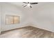 Empty bedroom with a ceiling fan and one window at 12941 W Flower St, Avondale, AZ 85392