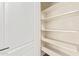 This spacious pantry features ample shelving at 12941 W Flower St, Avondale, AZ 85392