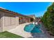 Private pool provides a refreshing escape with mature landscaping and inviting outdoor seating at 12941 W Flower St, Avondale, AZ 85392