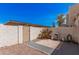 The backyard includes an outdoor kitchen and brick pavers at 1342 W Emerald Ave # 381, Mesa, AZ 85202