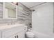 The bathroom is tiled with a modern single vanity at 1342 W Emerald Ave # 381, Mesa, AZ 85202