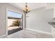 Dining room with tile floors and sliding doors leading to the outdoor patio at 1342 W Emerald Ave # 381, Mesa, AZ 85202
