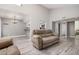 Open-concept living area featuring tiled floors and plenty of natural light at 1342 W Emerald Ave # 381, Mesa, AZ 85202