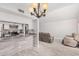 Open-concept living area with granite countertops and seamlessly flowing into the kitchen at 1342 W Emerald Ave # 381, Mesa, AZ 85202