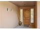 Welcoming home entrance featuring a wooden door, decorative vase, and neutral walls at 13600 N Fountain Hills Blvd # 405, Fountain Hills, AZ 85268