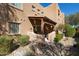 Exterior with private covered patio and desert landscaping, offering outdoor living space at 13600 N Fountain Hills Blvd # 405, Fountain Hills, AZ 85268