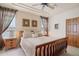 Cozy main bedroom featuring ceiling fan, soft lighting, and comfortable neutral decor at 13600 N Fountain Hills Blvd # 405, Fountain Hills, AZ 85268
