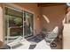Charming outdoor patio area with wrought iron furniture, perfect for relaxation and entertaining at 13600 N Fountain Hills Blvd # 405, Fountain Hills, AZ 85268