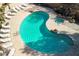 Aerial view of a private pool and spa with lounge chairs, creating a serene outdoor space at 13600 N Fountain Hills Blvd # 405, Fountain Hills, AZ 85268