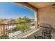 Cozy balcony with seating providing relaxed outdoor living with scenic neighborhood views at 14575 W Mountain View Blvd # 10313, Surprise, AZ 85374