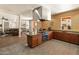 Spacious communal kitchen with stainless steel appliances and stone countertops at 14575 W Mountain View Blvd # 10313, Surprise, AZ 85374