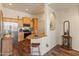 Open kitchen featuring stainless steel appliances, granite countertops and an adjacent breakfast bar with seating at 14575 W Mountain View Blvd # 10313, Surprise, AZ 85374
