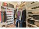 Spacious walk-in closet with well-organized shelving and clothing racks at 14575 W Mountain View Blvd # 10313, Surprise, AZ 85374