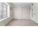 Bright bedroom features large closet with sliding doors and a window that brings in plenty of natural light at 14655 N Kings Way, Fountain Hills, AZ 85268