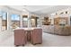 Cozy dining and living area with a fireplace, abundant natural light, and outdoor access at 14655 N Kings Way, Fountain Hills, AZ 85268