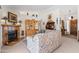Comfortable living room featuring a fireplace, built-in display cabinet, and vaulted ceilings at 14655 N Kings Way, Fountain Hills, AZ 85268