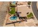Beautiful home with a backyard pool and a well manicured lawn at 15055 S 40Th Pl, Phoenix, AZ 85044