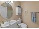 This bathroom offers a single sink, toilet, vanity and shower at 15055 S 40Th Pl, Phoenix, AZ 85044