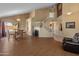 Dining area with staircase, arched doorway, and natural light at 15055 S 40Th Pl, Phoenix, AZ 85044