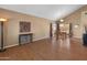 Bright dining area with wood floors, a wooden table and chairs, with a view of the backyard at 15055 S 40Th Pl, Phoenix, AZ 85044