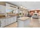 Bright eat-in kitchen with granite countertops, stainless appliances, and large windows at 15055 S 40Th Pl, Phoenix, AZ 85044