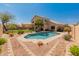 Backyard showcasing a refreshing in-ground pool, desert landscaping, and a two-story home at 15055 S 40Th Pl, Phoenix, AZ 85044