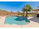 Refreshing in-ground pool with desert landscaping and lush lawn for ultimate outdoor enjoyment at 15055 S 40Th Pl, Phoenix, AZ 85044