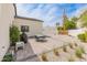 Inviting backyard featuring a dining table and chairs, gravel, patio, and neat landscaping at 1506 E Tuckey Ln, Phoenix, AZ 85014