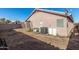 Large backyard featuring stone pathway, firepit, mature landscaping, ample space for recreation at 16150 N 86Th Ave, Peoria, AZ 85382