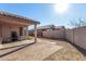 A cozy backyard with a covered patio and brick-paved area, perfect for outdoor relaxation and entertaining at 16150 N 86Th Ave, Peoria, AZ 85382