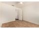 Bedroom featuring tile floors, a ceiling fan, and closet at 16150 N 86Th Ave, Peoria, AZ 85382