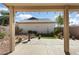 Enjoy this backyard view from the covered patio with desert landscaping and an easy-care yard at 16160 W Starlight Dr, Surprise, AZ 85374