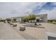 Exterior view of the Asante Library, a modern community resource with ample parking and landscaping at 16526 W Calle Lejos --, Surprise, AZ 85387