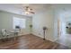 Inviting office space with hardwood floors, a ceiling fan, and a bright window for a productive workspace at 16526 W Calle Lejos --, Surprise, AZ 85387