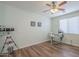 Functional office with a ceiling fan and natural light at 16526 W Calle Lejos --, Surprise, AZ 85387