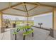 Covered ramada with a picnic table and BBQ grill in the community park at 16526 W Calle Lejos --, Surprise, AZ 85387