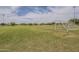 View of a soccer field, showcasing the expansive green space for recreational activities and sports at 16526 W Calle Lejos --, Surprise, AZ 85387