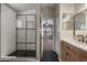 Bright bathroom with updated walk-in shower, sleek vanity, and modern fixtures at 1683 W Maplewood St, Chandler, AZ 85286