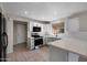 Modern kitchen featuring white cabinets, stainless steel appliances, and quartz countertops at 1683 W Maplewood St, Chandler, AZ 85286
