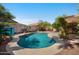 Inviting backyard pool with sparkling water and a well-maintained patio, perfect for relaxation and outdoor entertainment at 1683 W Maplewood St, Chandler, AZ 85286