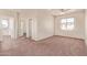 Spacious bedroom with walk in closet and neutral walls, creating a welcoming space at 17458 W Wandering Creek Rd, Goodyear, AZ 85338