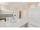Open-concept kitchen features modern appliances and ample storage at 17458 W Wandering Creek Rd, Goodyear, AZ 85338